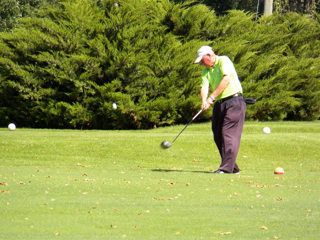  Tom Grange rotates nicely through his tee shot on #15.